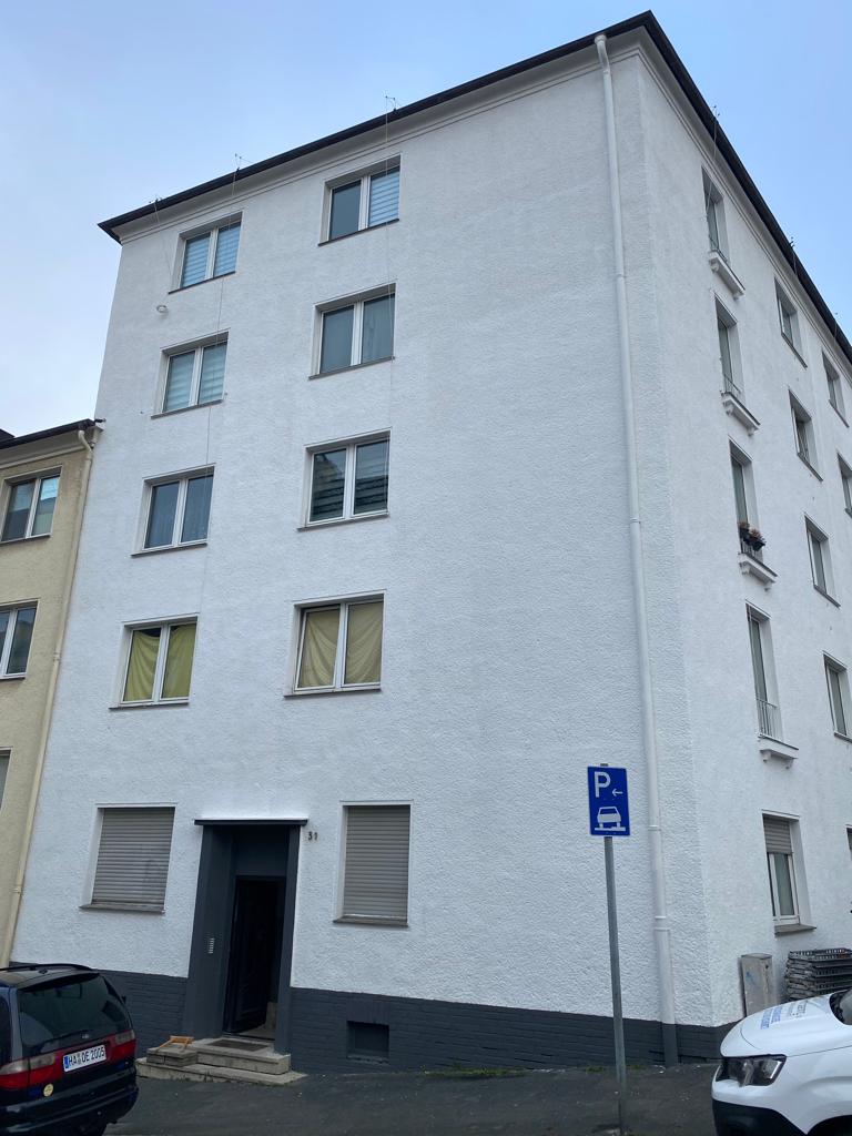 Projekt Borsigstr .31 Nachher 3 Seitenansicht eines Mehrfamilienhauses nach der Sanierung in Hagen
